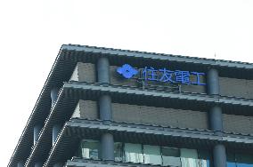Logo mark of Sumitomo Electric Industries, Ltd.